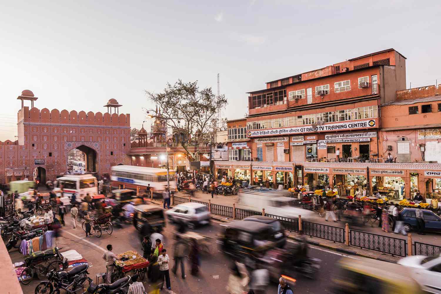 Street and pink city gateway in Jaipur